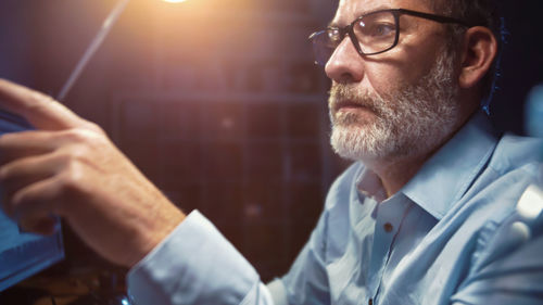 Portrait of man wearing eyeglasses