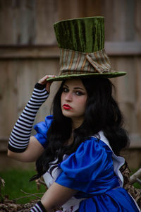 Portrait of young woman looking away