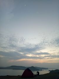 Scenic view of landscape against sky during sunset