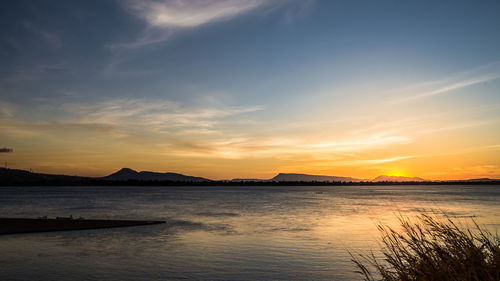 Scenic view of sea against sky during sunset