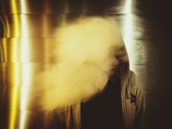 Close-up of person against blurred background