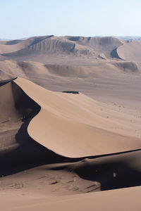 Scenic view of desert against clear sky