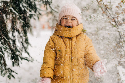 Portrait of man in snow