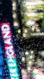 Close-up of wet car window