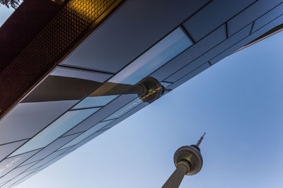 Low angle view of street light against sky