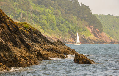 Scenic view of sea and rock formation