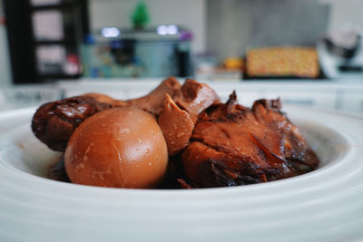 Close-up of meat in plate on table