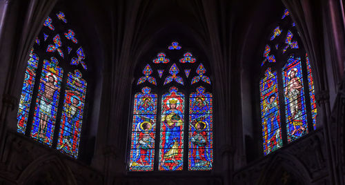 Low angle view of glass window in temple