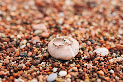 High angle view of stones on pebbles