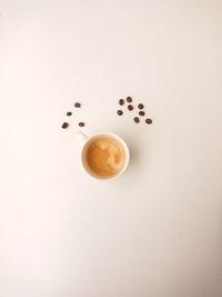 High angle view of coffee over white background with copy space