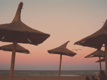 Scenic view of sea against sky at sunset