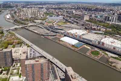 Aerial view of bridge over river in city