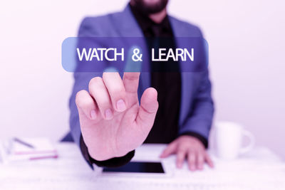 Close-up of human hand against white background