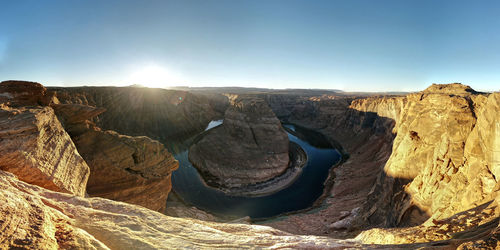 Panoramic view of rocks and mountains against sky