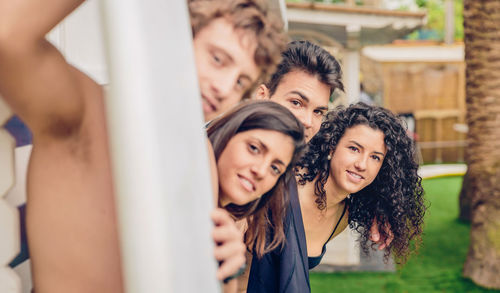 Portrait of smiling young friends