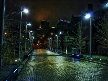 Illuminated street lights at night