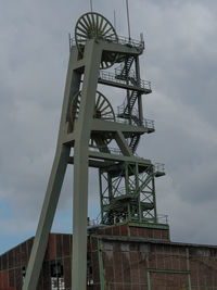 Low angle view of crane at construction site