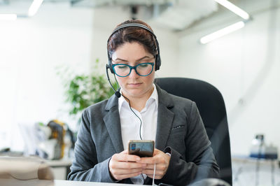 Young woman using mobile phone