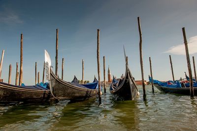 Boats moored in sea