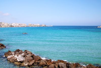 Scenic view of sea against clear sky