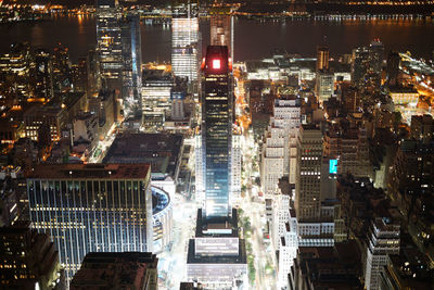 High angle view of city buildings at night