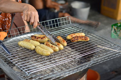 Close-up of meat on barbecue grill