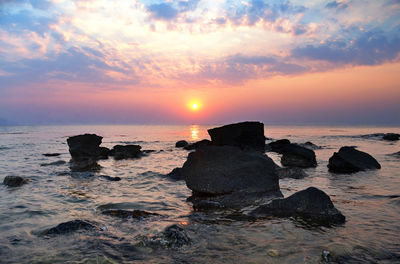 Scenic view of sea against sky during sunset