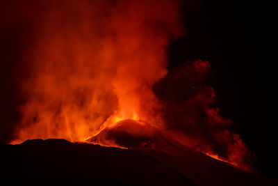 Scenic view of volcanic mountain during night