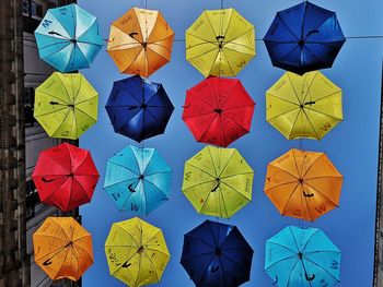 Close-up of multi colored umbrellas