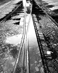 High angle view of railroad tracks by water