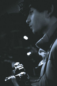 Portrait of young man looking away