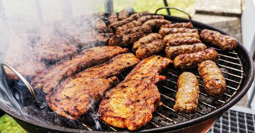 Close-up of meat on barbecue grill