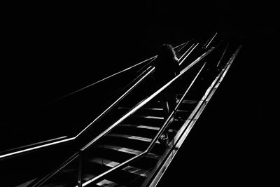 Low angle view of staircase against sky at night