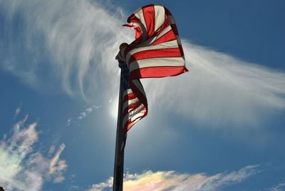 Low angle view of flag against sky