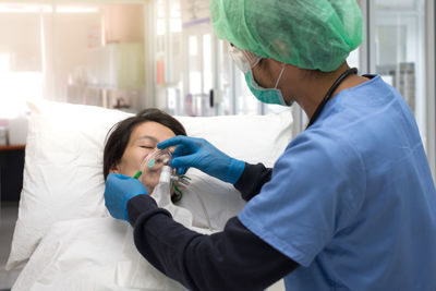 Portrait of woman holding hands