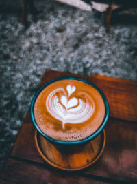 High angle view of cappuccino on table