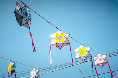 Low angle view of kite against clear sky