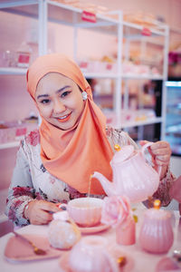 Portrait of a smiling young woman