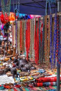 Various hanging for sale at market stall