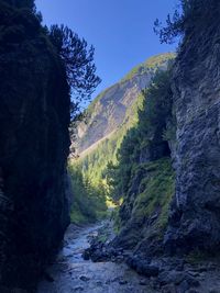 Scenic view of rocky mountains against clear sky