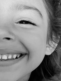 Close-up portrait of a smiling young woman