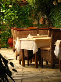 Empty chairs and table in basket