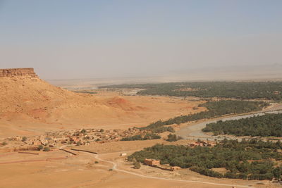 Scenic view of desert against clear sky