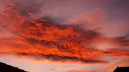 Low angle view of dramatic sky during sunset