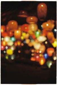 Close-up of illuminated lights at night