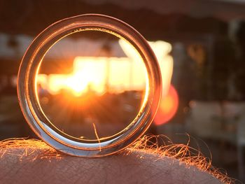 Close-up of illuminated fire at sunset