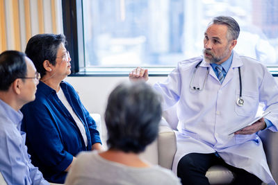 Doctor examining patient in hospital