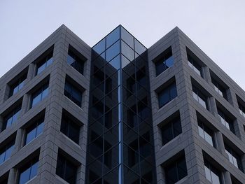 Low angle view of modern building against clear sky