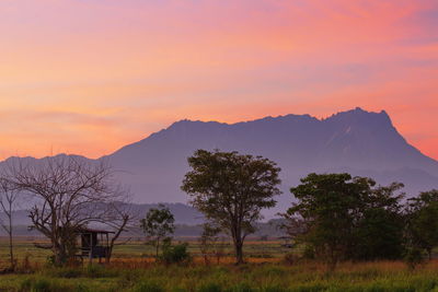 Scenic view of mountains against sky during sunset