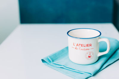 Close-up of coffee cup on table